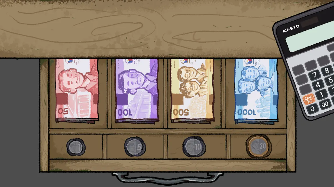 The cash drawer with peso coins and banknotes